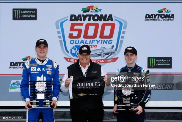 Alex Bowman, driver of the Nationwide Chevrolet, team owner Rick Hendrick and William Byron, driver of the Axalta Chevrolet, celebrate after winning...