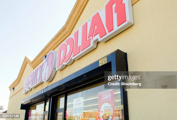 Family Dollar Stores Inc. Signage is displayed outside of at a store in the Queens borough of New York, U.S., on Wednesday, March 2, 2011. Family...