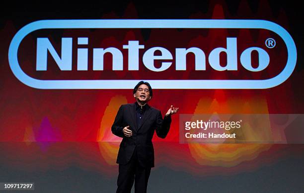 In this handout image provided by Nintendo of America, Satoru Iwata, president of Nintendo Co. Ltd., gives the keynote address at the Game Developers...