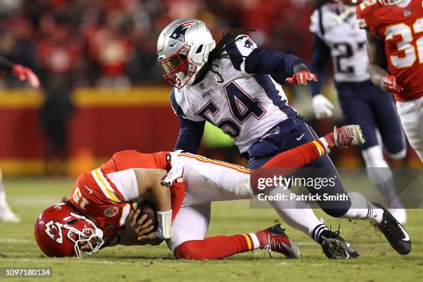 Patrick Mahomes of the Kansas City Chiefs recovers the ball after fumbling in the second quarter against the New England Patriots during the AFC...