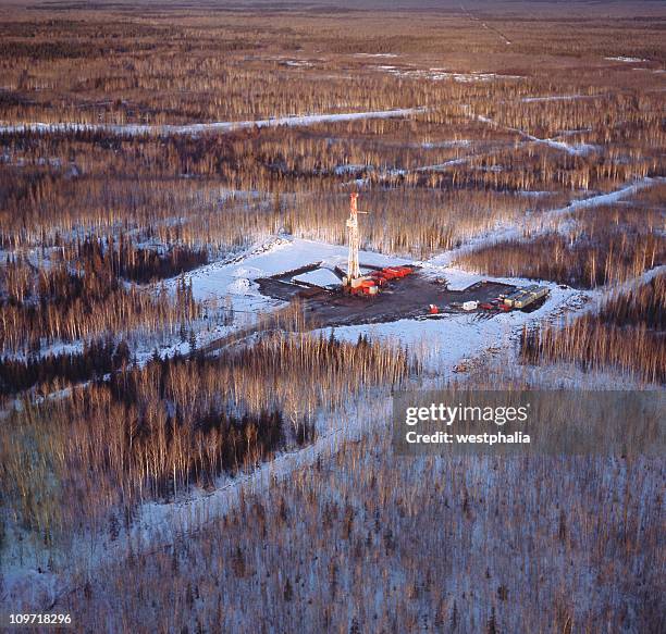drilling rig from the air - mckenzie river delta stock pictures, royalty-free photos & images