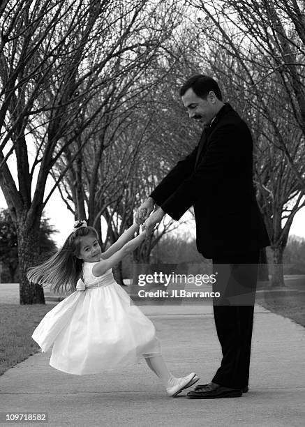 flower girl dancing with father, black and white - daughter wedding stock pictures, royalty-free photos & images