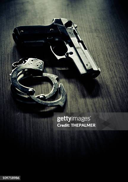 guns and no roses - handgun stock pictures, royalty-free photos & images