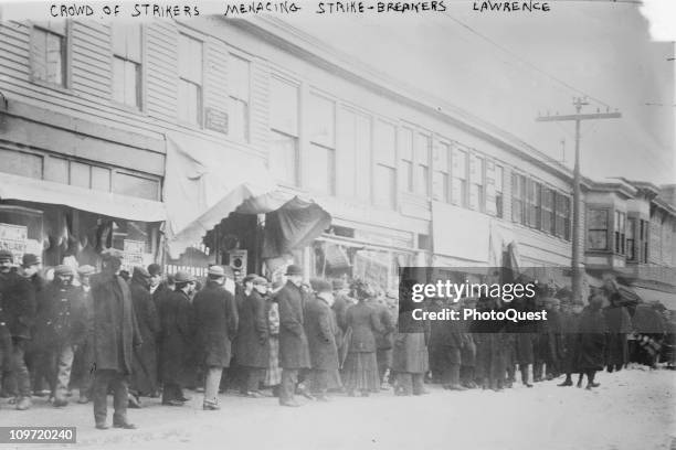 View showing a crowd of strikers, during the Lawrence textile strike known as the Bread and Roses strike, Lawrence, Massachussetts, 1912.