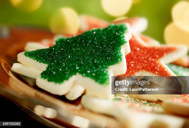 christmas cookies by the tree - kaka med socker bildbanksfoton och bilder