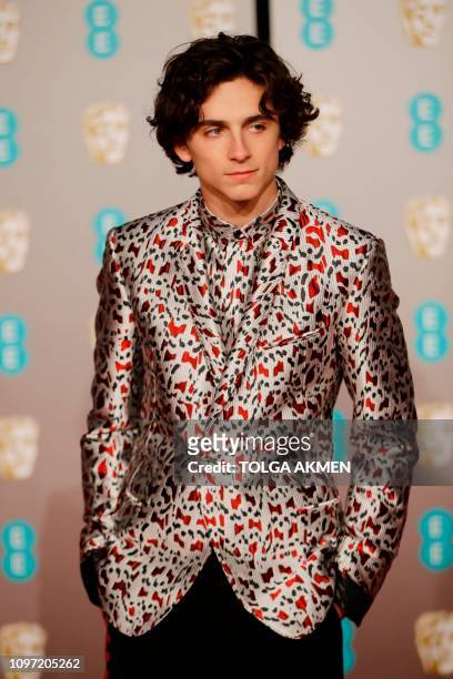 French-US actor Timothee Chalamet poses on the red carpet upon arrival at the BAFTA British Academy Film Awards at the Royal Albert Hall in London on...