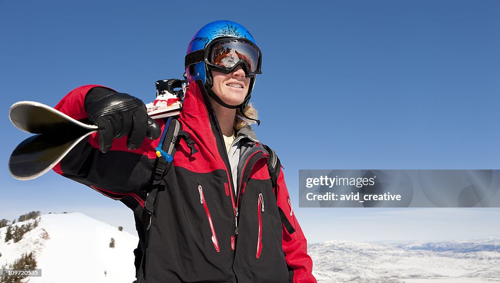 Skier On Top Of The World Looking at View