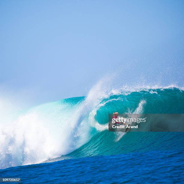 surfing - indonesia surfing stock pictures, royalty-free photos & images