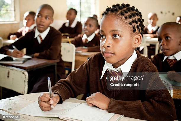 african school children in the classroom - tanzania bildbanksfoton och bilder