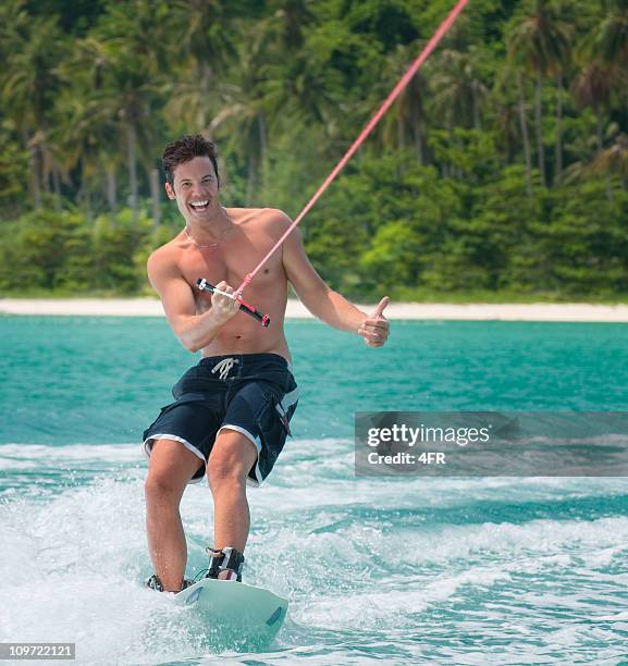 wakeboarding on tropical waters - glider stock pictures, royalty-free photos & images