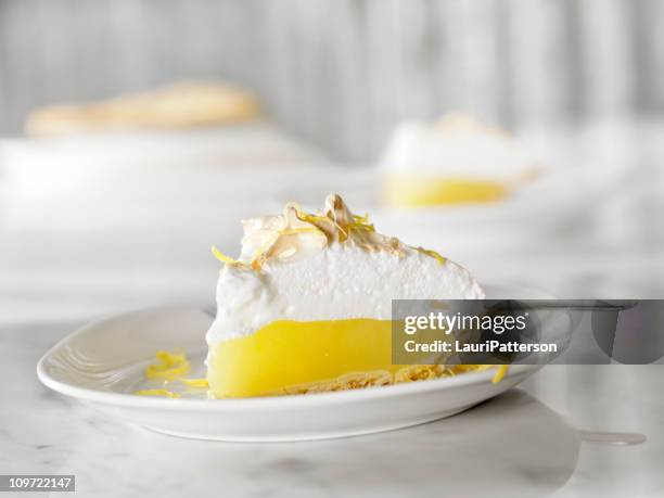 lemon meringue pie - lemon slice stock pictures, royalty-free photos & images