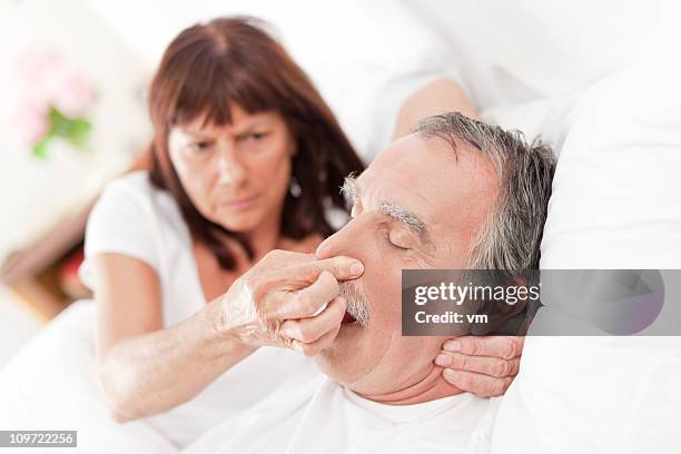 snoring husband - snoring stock pictures, royalty-free photos & images