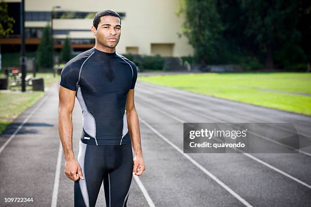african american young male athlete on running track, copy space - spandex stock pictures, royalty-free photos & images