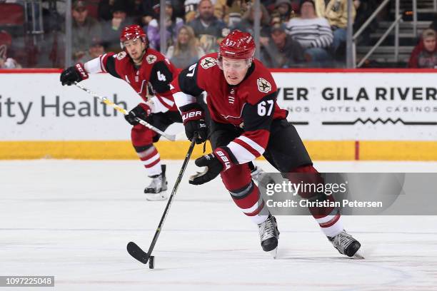 Lawson Crouse of the Arizona Coyotes skates with the puck during the NHL game against the Vegas Golden Knights at Gila River Arena on December 30,...