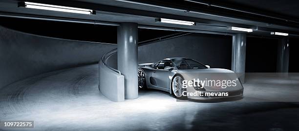 sports car in underground carpark - silver porsche stock pictures, royalty-free photos & images