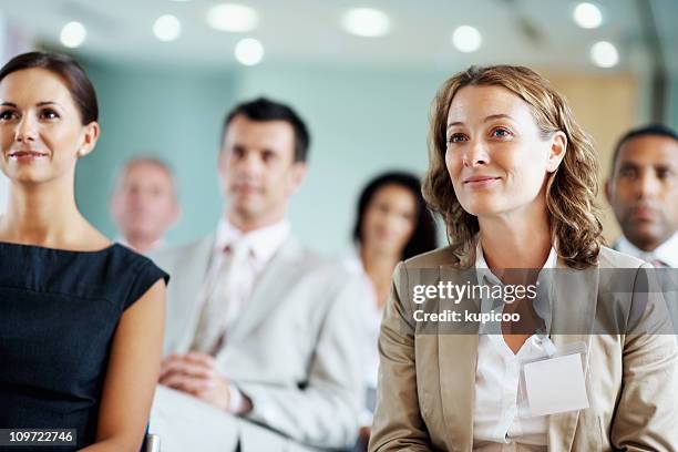 business team at a seminar - 禮堂 個照片及圖片檔