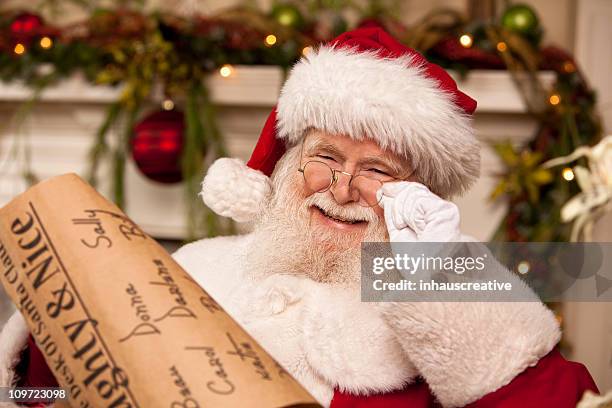 pictures of real santa claus's list he's checking twice - liste stock pictures, royalty-free photos & images