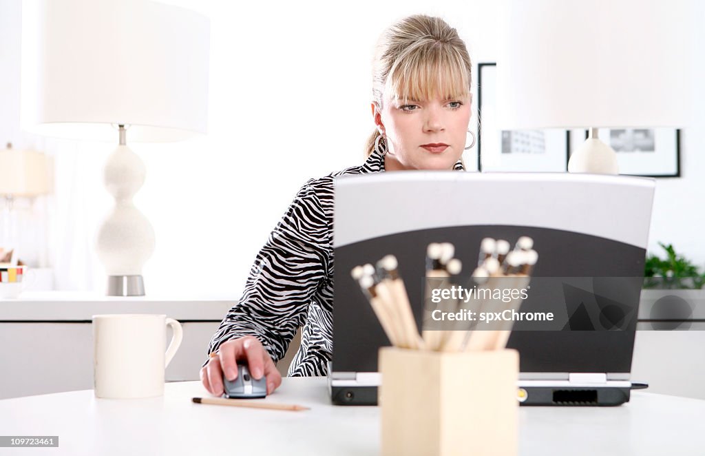 Woman working on Laptop