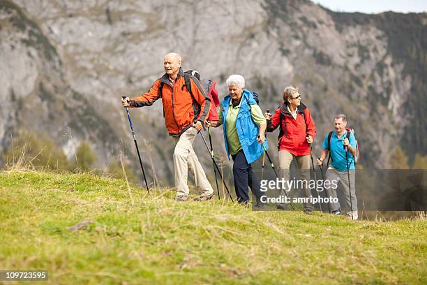 hiking seniors - senior women hiking stock pictures, royalty-free photos & images