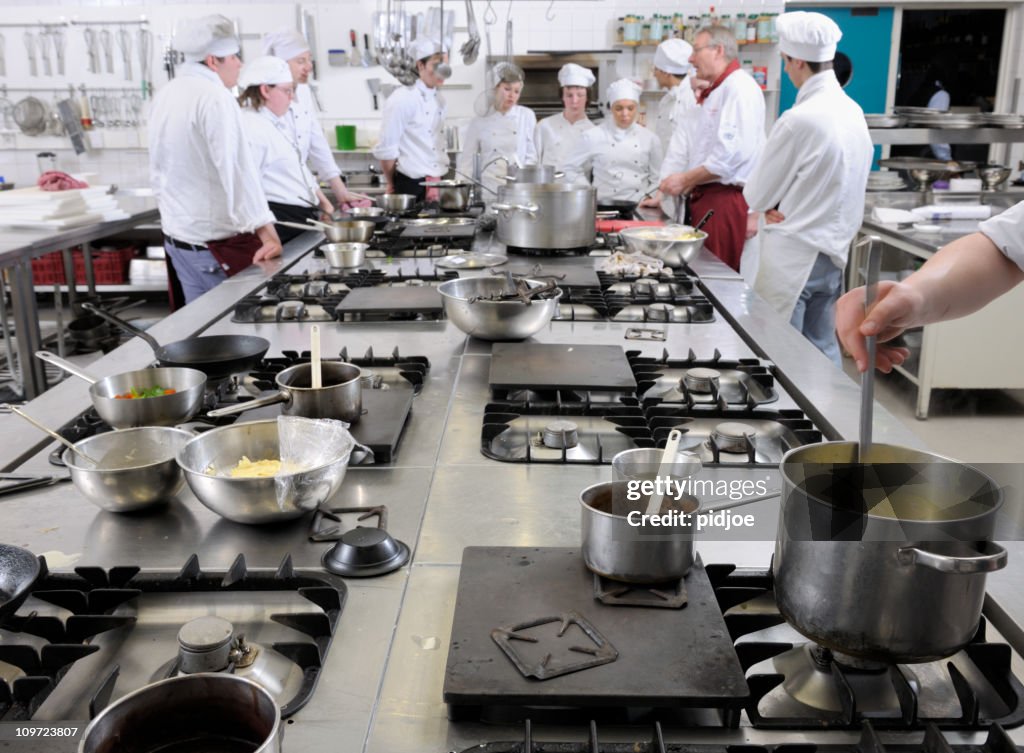 Chef trainees in cooking class XXXL image
