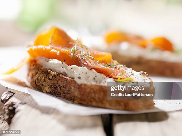 smoked salmon canapes with cream cheese - cream cheese stock pictures, royalty-free photos & images