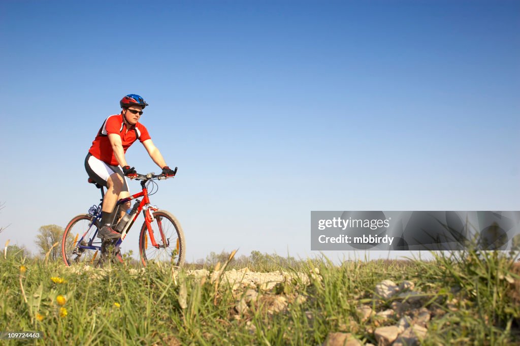 Mountainbiker on mountain bike in scenic shoot