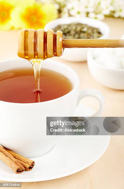 tea and honey - honey jar stock pictures, royalty-free photos & images