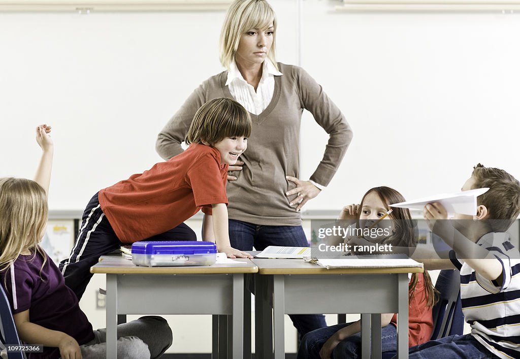 Frustrated Teacher and Misbehaving Students