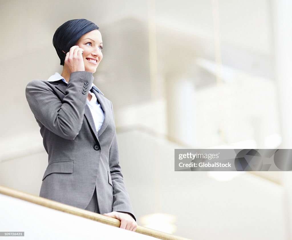 Businesswoman talking on mobile phone