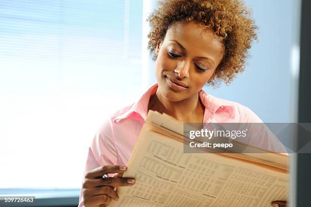 business woman - financial times stock pictures, royalty-free photos & images