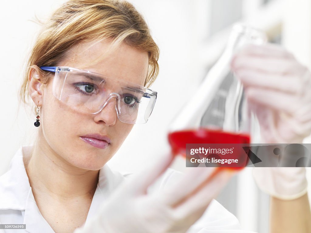 Researcher working with chemicals