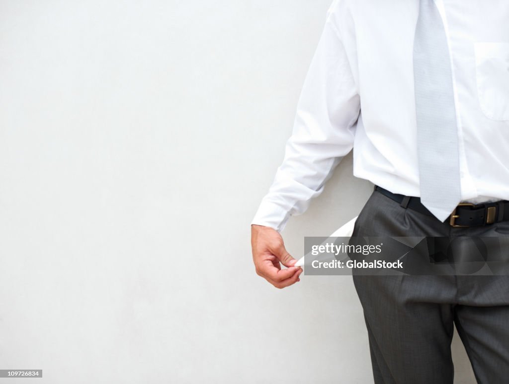 Close-up of businessman with pocket out