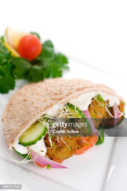 falafel pita sandwich - pitta bread stock pictures, royalty-free photos & images