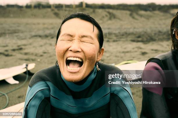 facial expression portrait of mature japanese woman - rain face stock pictures, royalty-free photos & images