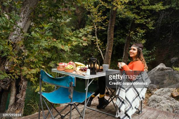having a fresh breakfast in forest - foldable stock pictures, royalty-free photos & images