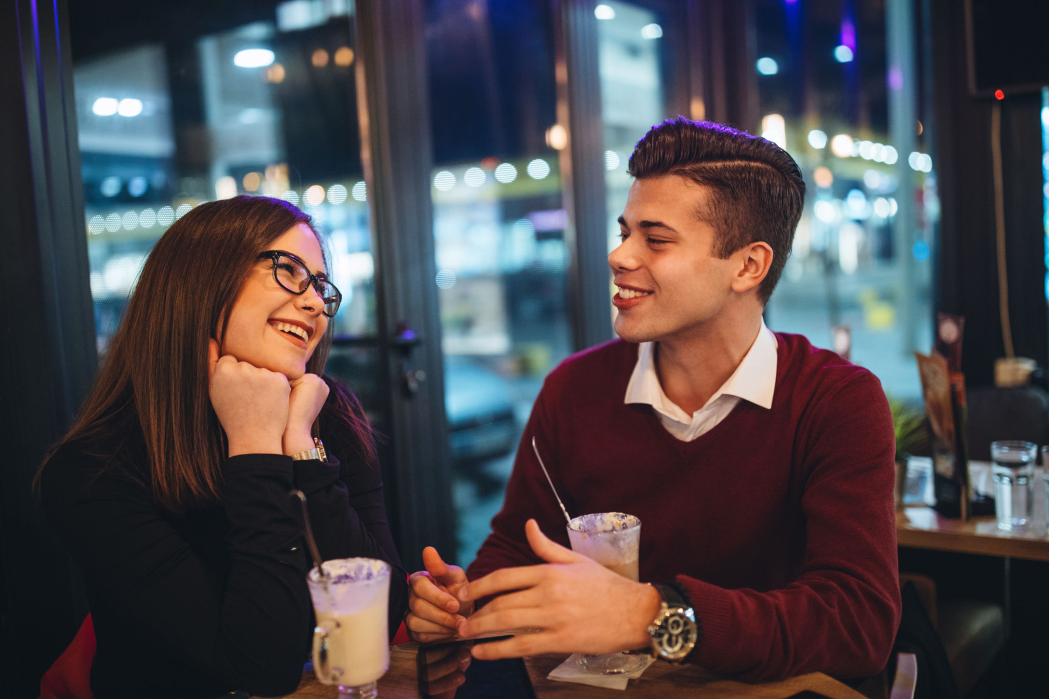 Cute young couple in cafe Cute young couple in cafe