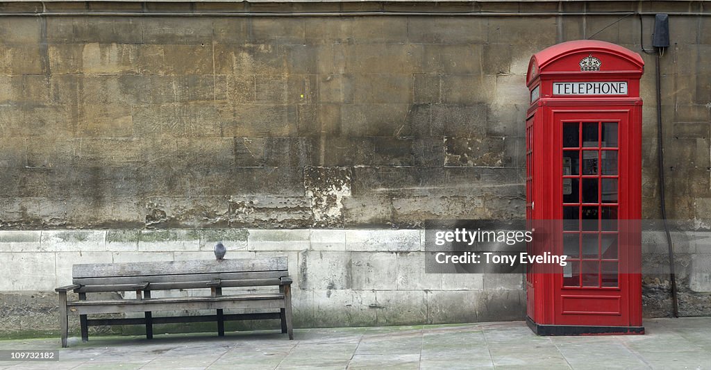 Red phone box and bench seat, London
