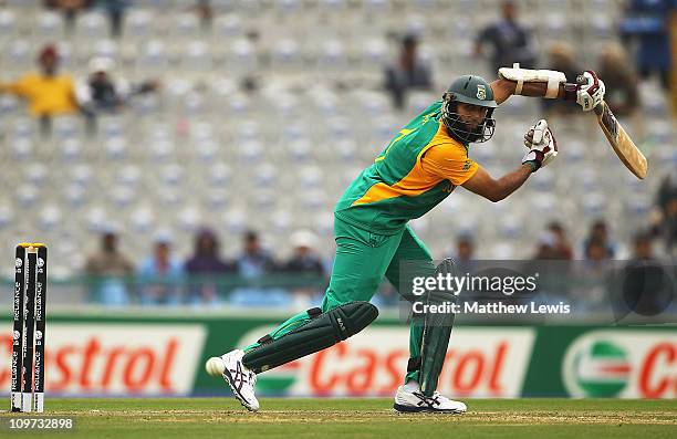 Hashim Amla of South Africa edges the ball towards the boundary during the 2011 ICC World Cup Group B match between Netherlands and South Africa at...