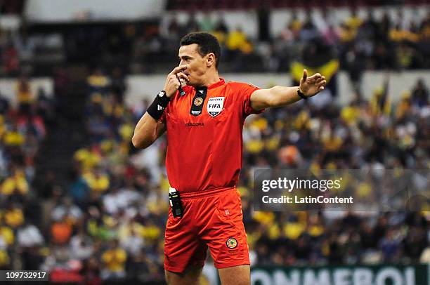 Referee Filmar Roldan during a match as part of the 2011 Copa Santander Libertadores Tournament at the Azteca Stadium on March 2, 2011 in Mexico...