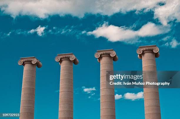 columns at plaza spain. barcelona - four objects stock-fotos und bilder