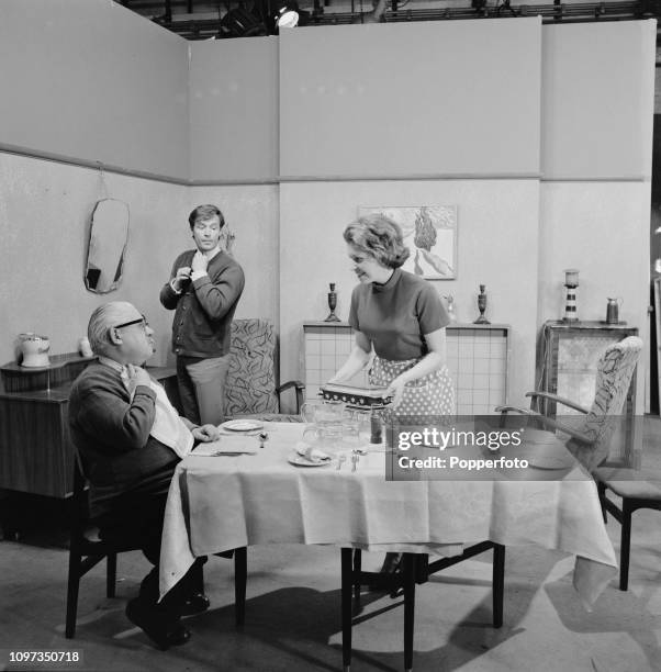 English actor Jack Howarth as Albert Tatlock, pictured on left with fellow actors William Roache, playing Ken Barlow and Anne Reid, playing Valerie...