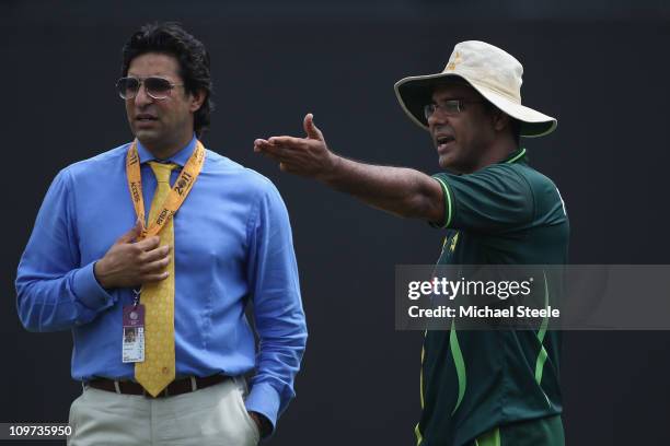 Waqar Younis coach of Pakistan in conversation with Wasim Akram ex Pakistan international and television commentator during the Canada v Pakistan...