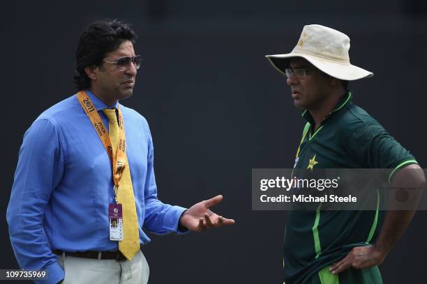 Waqar Younis coach of Pakistan in conversation with Wasim Akram ex Pakistan international and television commentator during the Canada v Pakistan...