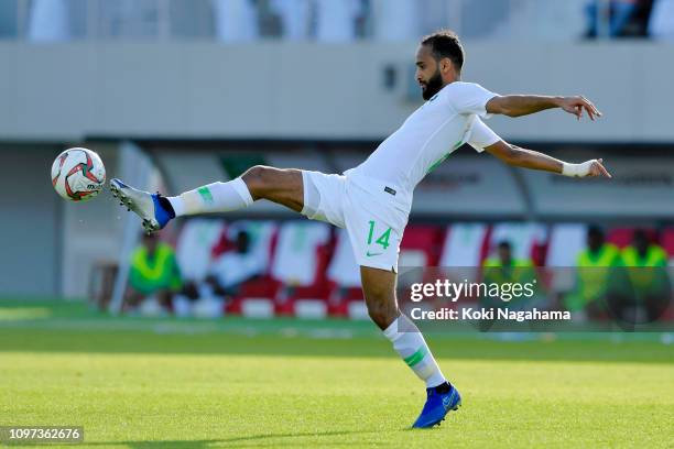 Abdullah Otayf of Saudi Arabia in action during the AFC Asian Cup round of 16 match between Japan and Saudi Arabia at Sharjah Stadium on January 21,...