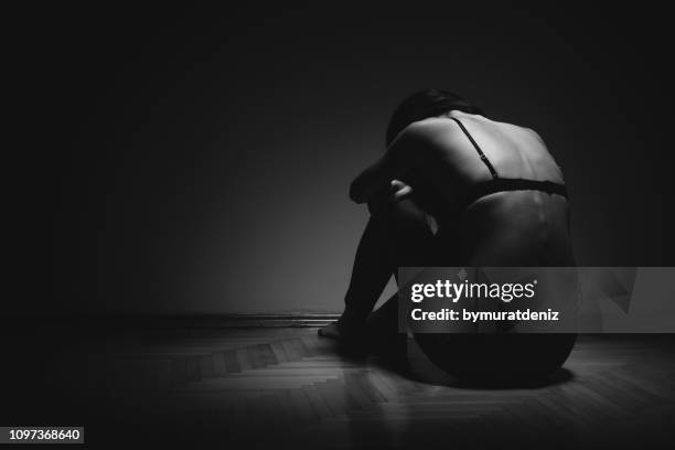 alone girl in room - bulimie stock pictures, royalty-free photos & images