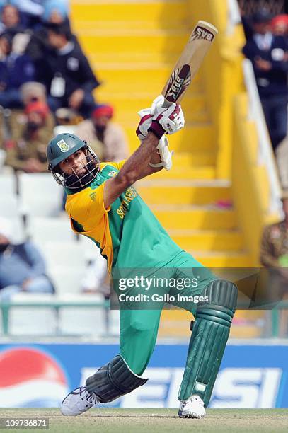 Hashim Amla of South Africa hits out during the ICC Cricket World Cup match between South Africa and Netherlands from Punjab Stadium on March 03,...