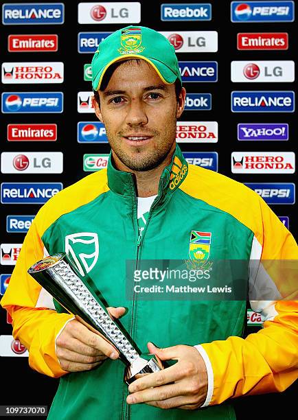 De Villiers of South Africa pictured with the 'Man of the Match' award during the 2011 ICC World Cup Group B match between Netherlands and South...