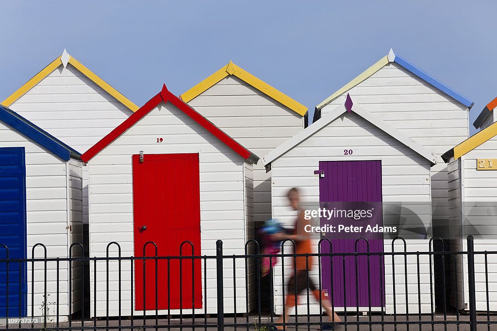 Beach Huts & Boy, Devon, England