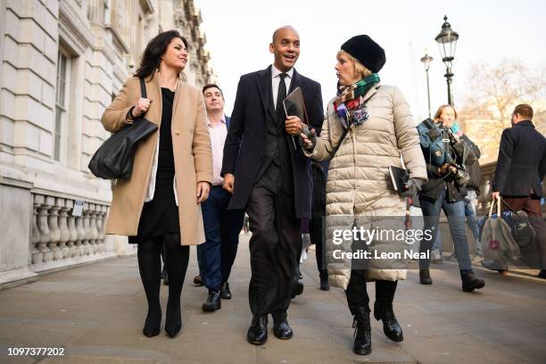 Labour MP Chuka Umunna walks with Conservative MPs Heidi Allen and Anna Soubry as they leave the Cabinet Office following a Brexit meeting with...