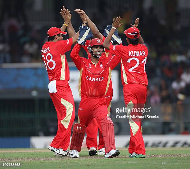 Ashish Bagai celebrates with Nitish Kumar after catching Shahid Afridi off the bowling of Rizwan Cheema during the Canada v Pakistan 2011 ICC World...